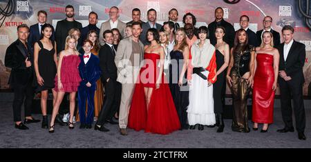 HOLLYWOOD, LOS ANGELES, CALIFORNIA, USA - DECEMBER 13: Greg Kriek, Shay Hatten, Lila Barad, Stella Grace Fitzgerald, Stuart Martin, Caden Dragomer, Kayden Koshelev, Kingston Foster, Tomm Voss, Zack Snyder, Charlotte Maggi, Ingvar Eggert Sigurðsson, Ed Skrein, Staz Nair, Eric Newman, Sofia Boutella, Sky Yang, Michiel Huisman, Charlie Hunnam, Deborah Snyder, Djimon Hounsou, Fra Fee, Bae Doona, E. Duffy, Ray Fisher, Cleopatra Coleman, Kurt Johnstad, Wesley Coller, Jena Malone and Cary Elwes arrive at the Los Angeles Premiere Of Netflix's 'Rebel Moon - Part One: A Child Of Fire' held at the TCL Ch Stock Photo