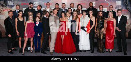 HOLLYWOOD, LOS ANGELES, CALIFORNIA, USA - DECEMBER 13: Greg Kriek, Shay Hatten, Lila Barad, Stella Grace Fitzgerald, Stuart Martin, Caden Dragomer, Kayden Koshelev, Kingston Foster, Tomm Voss, Zack Snyder, Charlotte Maggi, Ingvar Eggert Sigurðsson, Ed Skrein, Staz Nair, Eric Newman, Sofia Boutella, Sky Yang, Michiel Huisman, Charlie Hunnam, Deborah Snyder, Djimon Hounsou, Fra Fee, Bae Doona, E. Duffy, Ray Fisher, Cleopatra Coleman, Kurt Johnstad, Wesley Coller, Jena Malone and Cary Elwes arrive at the Los Angeles Premiere Of Netflix's 'Rebel Moon - Part One: A Child Of Fire' held at the TCL Ch Stock Photo