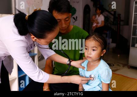 Children's pavilion run by Domincan catholic sisters. Child suffering of heart disease. Medical consultation. Stock Photo