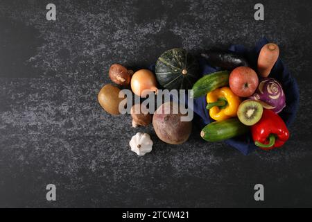 Vegetable ingredients on cement background Stock Photo