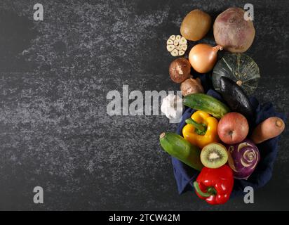 Vegetable ingredients on cement background Stock Photo