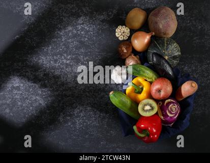 Vegetable ingredients on cement background Stock Photo