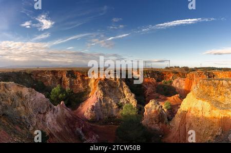 view of the Bauxite Quarries of Murgetta Rossi in the Alta Murgia National Park in southern Italy in war morning light Stock Photo