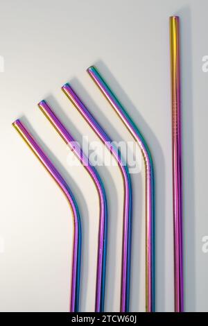 Several reusable metal straws, straight and bent. Plastic reduction concept. Stock Photo