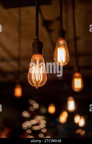 Group of Hanging Edison light bulb, also known as filament light bulb Stock Photo