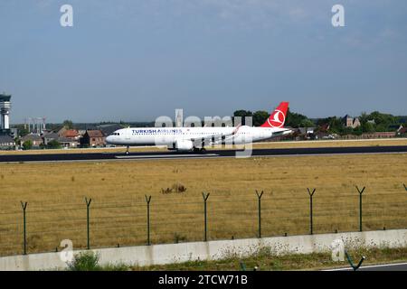 Turkish Airlines A321 rolling down runway 25L after touchdown at Brussels International Airport Stock Photo