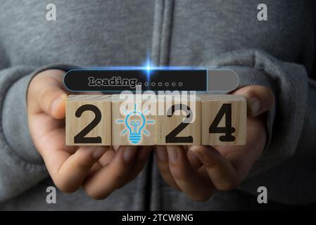 Concept. Loading progress 2024 until countdown. Merry Christmas and Happy New Year. Challenging planning and strategy in New Year 2024 concept Stock Photo