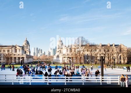 The Greenwich Ice Skating rink located in front of Queens House, London. The open air ice rink is a popular Christmas activity for everyone . Stock Photo