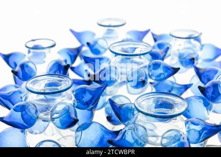 Abstract glass installation, empty blue vases close up photo with selective soft focus Stock Photo