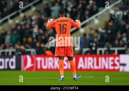 Newcastle, UK. 13th Dec, 2023. AC Milan goalkeeper Mike Maignan (16) celebrates his sides win during the Newcastle United FC v AC Milan UEFA Champions League Group F match at St.James' Park, Newcastle, United Kingdom on 13 December 2023 Credit: Every Second Media/Alamy Live News Stock Photo