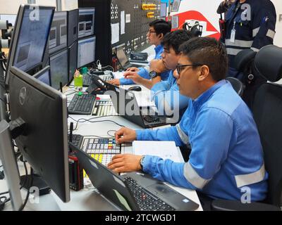 Petroperu personnel monitoring the systems in the control room of the New Talara Refinery facilities, operated by Petroperu, with the capacity to process up to 95,000 oil barrels per day and which has been built at a cost of more than 5,000 million dollars. Stock Photo