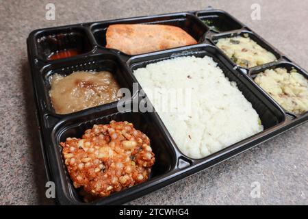 Indian UPwas thali, traditional fasting food platter or thaali. Farali Upwas food eaten during vrat Stock Photo