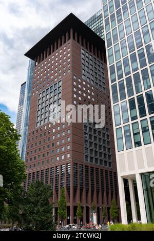 Modern multi-storey building. Bottom-Up view of Frankfurt Modern Buildings. Frankfurt am Main, Germany - August 16, 2023. Stock Photo