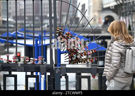 Love locks on a bridge railing on the Alster in Hamburg Stock Photo