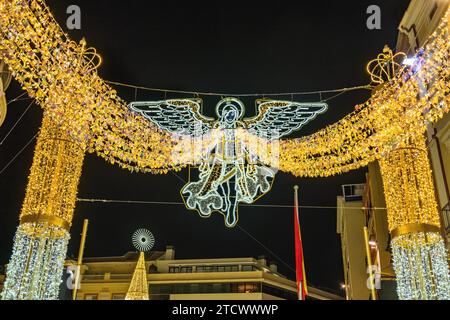 Malaga, Spain - November 25, 2023: Angels on christmas lights decorations on Larios street with a lot of people enjoying the show, in Malaga, Andalusi Stock Photo