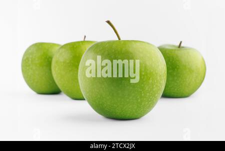 Fresh green apple isolated on white background. Clipping path. Stock Photo