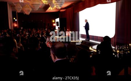 People attending a business presentation in an hotel Stock Photo