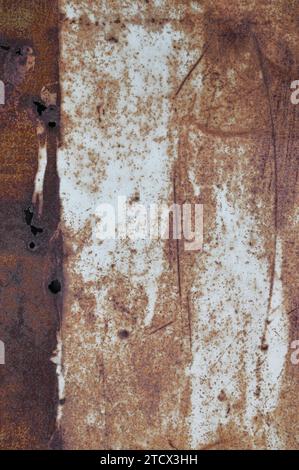 Old light blue grey painted rusty brown rustic iron metal plate background texture, vertical aged damaged weathered scratched plain paint pattern Stock Photo