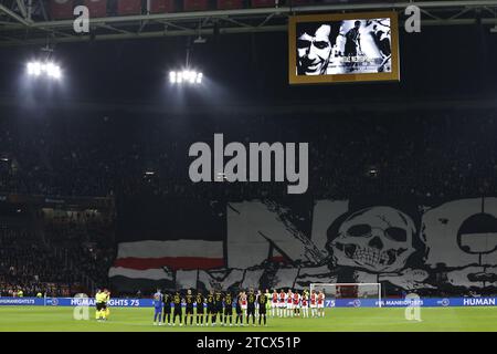 AMSTERDAM - Minute of silence for Kostas Nestoridis during the UEFA Europa League group B match between Ajax Amsterdam and AEK Athene FC at the Johan Cruyff ArenA on December 14, 2023 in Amsterdam, Netherlands. ANP MAURICE VAN STEEN Stock Photo