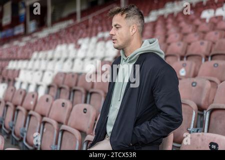 Cottbus, Germany. 14th Dec, 2023. Singer Alexander Knappe stands on an empty stand in the 'Stadium of Friendship'. Credit: Frank Hammerschmidt/dpa/Alamy Live News Stock Photo