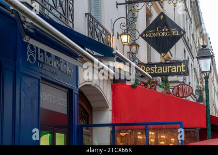 Shop and restaurant signs on Rue Montorgueil,Paris ,France Stock Photo