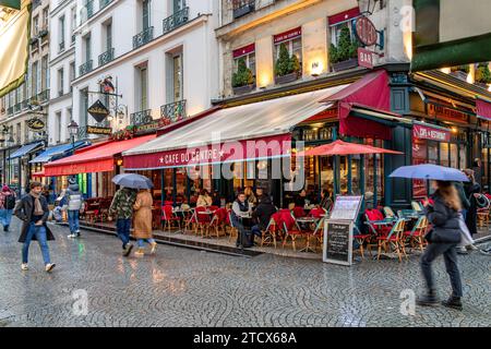 People sitting down on the outdoor terrace at Café du centre, a French restaurant ,cafe on Rue Montorgueil, Paris ,France Stock Photo