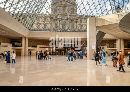 View from inside the Louvre museum with the glass and steel pyramid above the main entrance,Paris, France Stock Photo