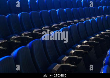 Full frame of folded bleachers in empty auditorium at conference hall Stock Photo