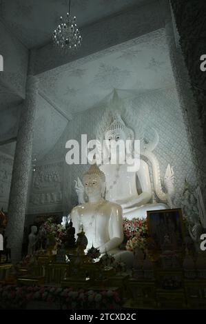 A main white Buddha sits in the Buddhism thai Church. It a beautiful Buddha at Wat Huay Pla Kang temple in Chiang Rai Province in Thailand. Stock Photo