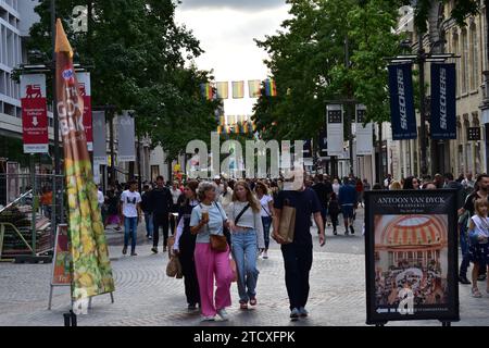 View of the large crowd of people strolling through the Meir shopping street in the city centre of Antwerp Stock Photo