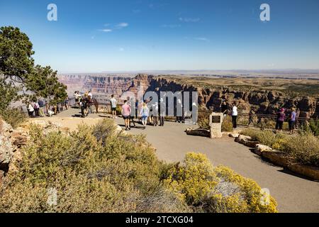Tourists at viewpoint next to Desert View Watchtower, South Rim, Grand Canyon, AZ, USA Stock Photo
