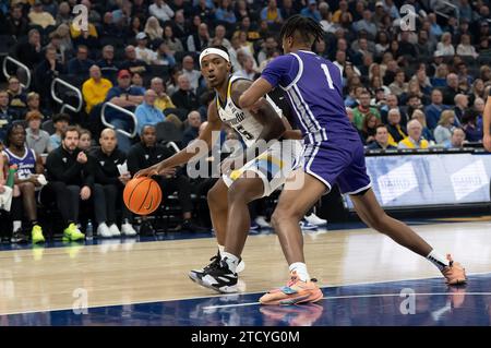 December 14, 2023: Marquette Golden Eagles guard Tre Norman (5) dribbles past St. Thomas - Minnesota Tommies guard Kendall Blue (1) during the NCAA basketball game between St. Thomas - Minnesota Tommies and the Marquette Golden Eagles at the Fiserv Forum in Milwaukee, WI. Kirsten Schmitt/Cal Sport Media. Stock Photo