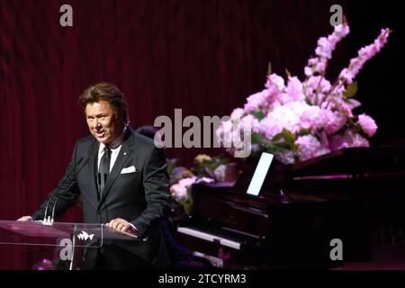 Richard Wilkins speaks during the State Memorial Service for Australian comedian and actor Barry Humphries at the Sydney Opera House in Sydney, Friday, December 15, 2023. A State Memorial Service for Barry Humphries will recognise the late entertainers contribution to Australian arts and entertainment. AAP Image/Pool, David Gray NO ARCHIVING SYDNEY NSW AUSTRALIA *** Richard Wilkins speaks during the State Memorial Service for Australian comedian and actor Barry Humphries at the Sydney Opera House in Sydney, Friday, December 15, 2023 A State Memorial Service for Barry Humphries will recognize t Stock Photo
