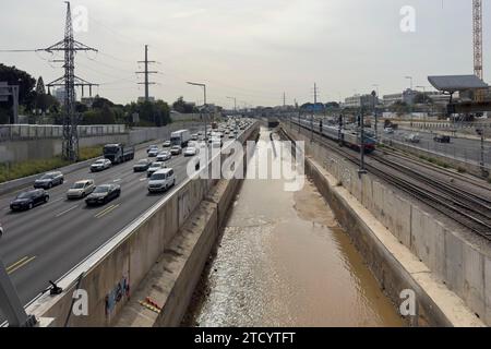 Overflow of the Ayalon river a perennial stream diverted from its original bed through an artificial concrete channel along the north-south Ayalon Freeway in Tel Aviv Israel Stock Photo