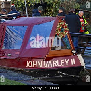 Santa Claus is refilling his present sack in the cratch of the John Varley II, in readiness for his next Santa Christmas cruise in Chesterfield. Stock Photo