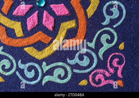 Beautiful and colourful Rangoli backdrop. Designer pattern of sand art ...