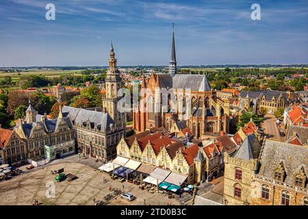 view of the market square Grote Markt with church of Saint Walburga and Belfry, Belgium, West Flanders, Veurne Stock Photo