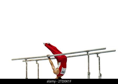 gymnast exercise parallel bars in championship gymnastics isolated on white background, element zhou shixioug Stock Photo