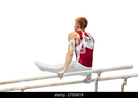 gymnast exercise parallel bars in gymnastics isolated on white background, element l-sit in support or through support on 2 bars Stock Photo