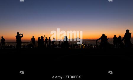 people observe and photograph Mount Fuji from the terrace of the Shibuya Sky Stock Photo