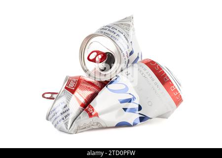 Moscow, Russia - December 13, 2023: Crumpled and empty cans of Bud beer on a white background. Copy space. Stock Photo