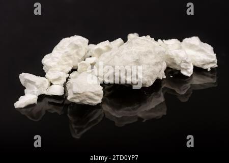 Crack cocaine is a form of cocaine that can be smoked. Also called rock, work, hard, iron, cavvy, base. Mostly known as crack Stock Photo