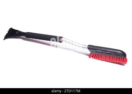 Car brush with a scraper for cleaning the car in winter about snow and ice, isolated on white Stock Photo