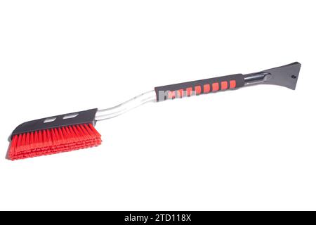 Car brush with a scraper for cleaning the car in winter about snow and ice, isolated on white Stock Photo