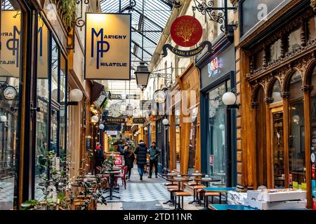 Located in the 2nd arrondissement, the Passage des Panoramas is full of boutique shops & restaurants and the oldest of the covered passages of Paris Stock Photo