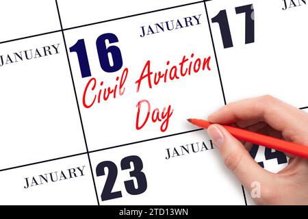 January 16. Hand writing text Civil Aviation Day on calendar date. Save the date. Holiday.  Day of the year concept. Stock Photo