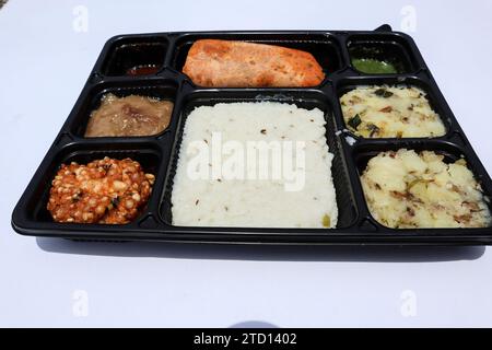 Indian UPwas thali, traditional fasting food platter or thaali. Farali Upwas food eaten during vrat Stock Photo