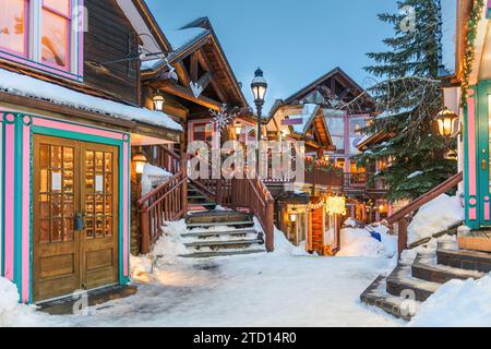 Breckenridge, Colorado, USA downtown streets at night in the winter with holiday lighting. Stock Photo