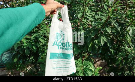 Apollo Pharmacy home delivery bag. Biodegradable Eco Friendly Plastic bag.Compostable thin polythene bag Stock Photo
