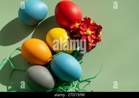 colorful eggs symbolize easter. Easter minimal concept. Creative Happy Easter, spring layout. Stock Photo